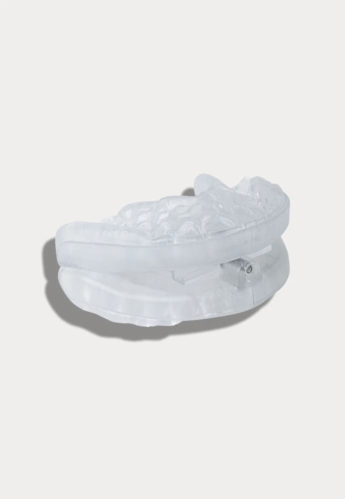 Oral appliance that advances the lower jaw